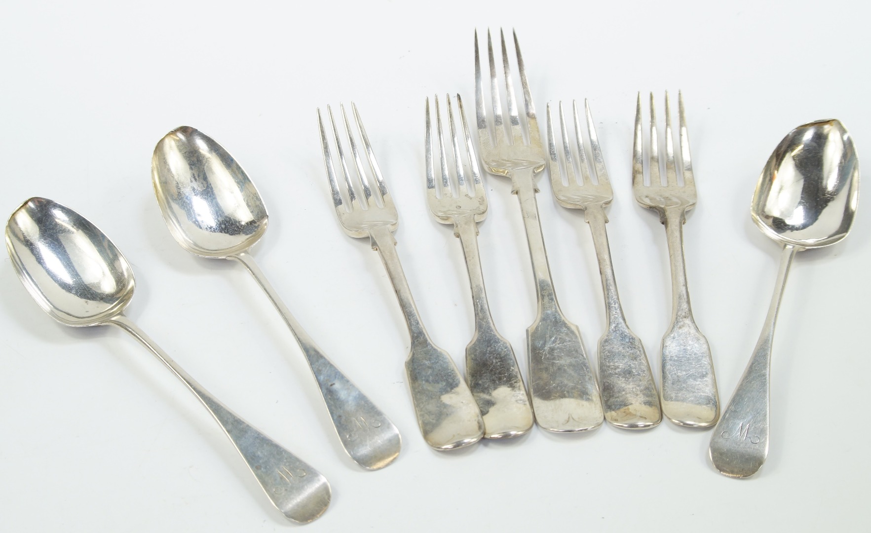 Appraisal: Victorian silver table forks dessert forks and dessert spoons decorated