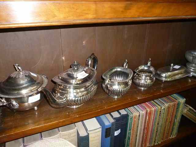 Appraisal: A SILVER PLATED GADROONED THREE PIECE TEA SET together with