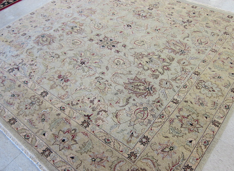 Appraisal: SQUARE ORIENTAL CARPET hand knotted in an overall floral design