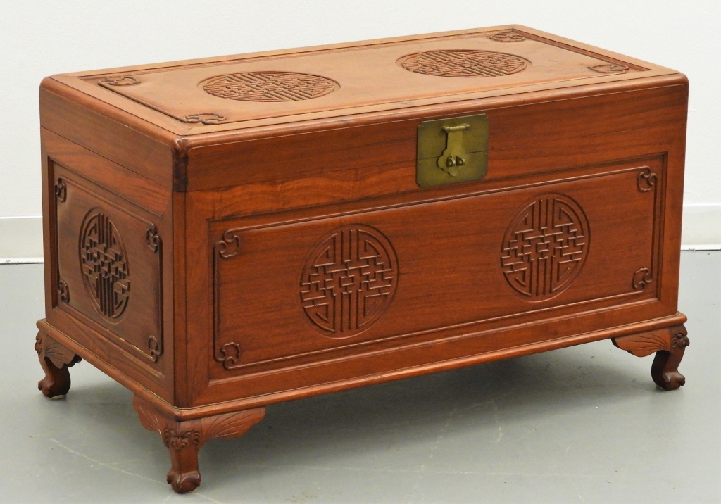 Appraisal: CHINESE CARVED CAMPHOR WOOD STORAGE CHEST China th CenturyRectangular form