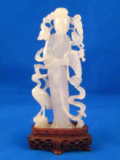 Appraisal: A carved jade figure of a female Chinese deity on