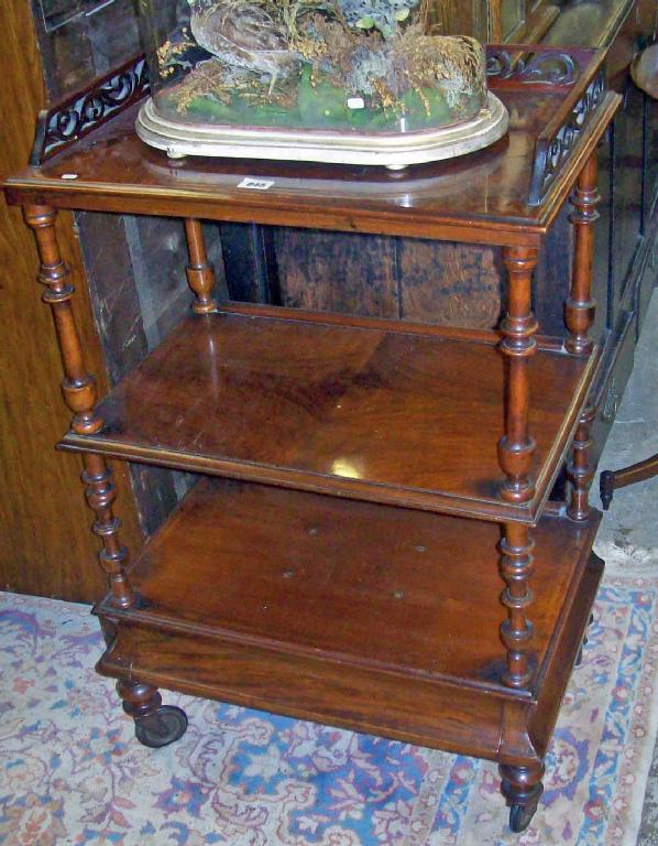 Appraisal: A Victorian figured walnut whatnot -