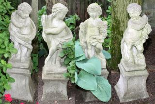 Appraisal: CEMENT FIGURAL GARDEN SCULPTURES SET OF FOUR C W PARKER