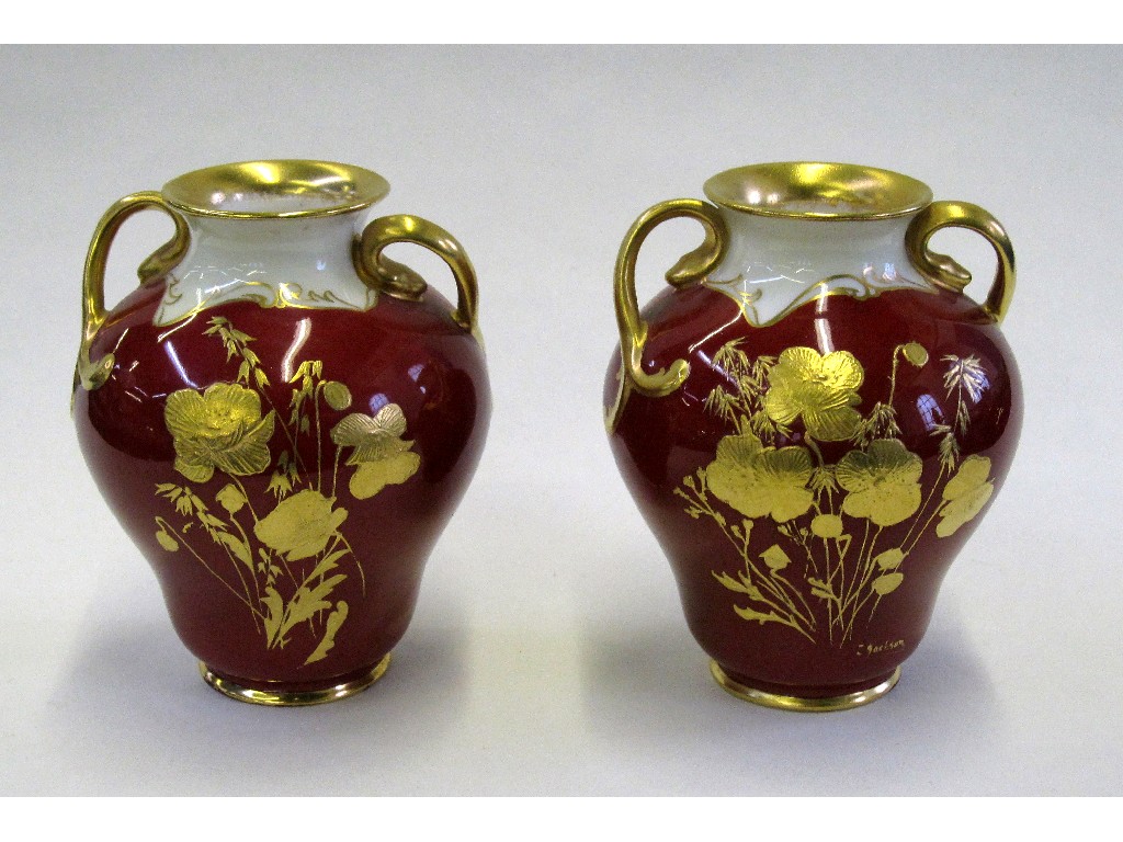 Appraisal: Pair of small Doulton vases decorated with gilt flowers of