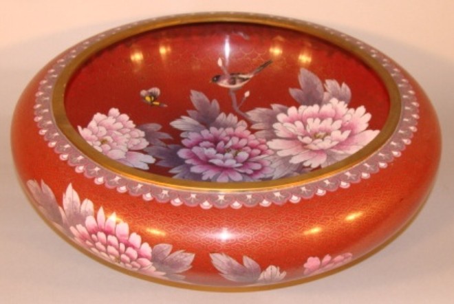 Appraisal: Red ground with flowers bird and butterfly decoration H inches