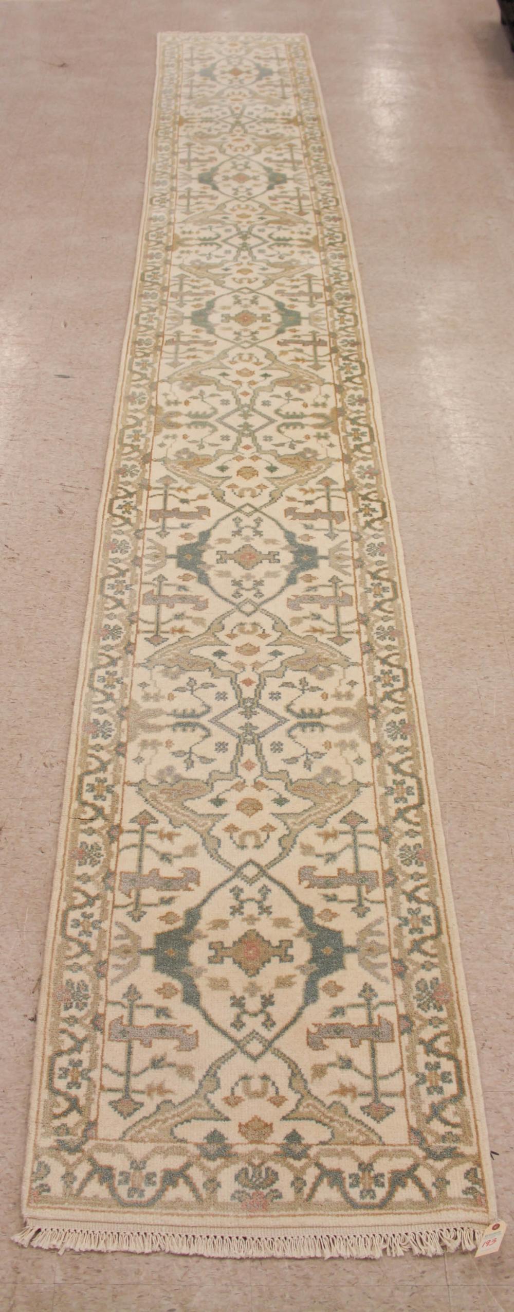 Appraisal: HAND KNOTTED ORIENTAL RUNNER Indo-Persian curvilinear geometric and stylized floral