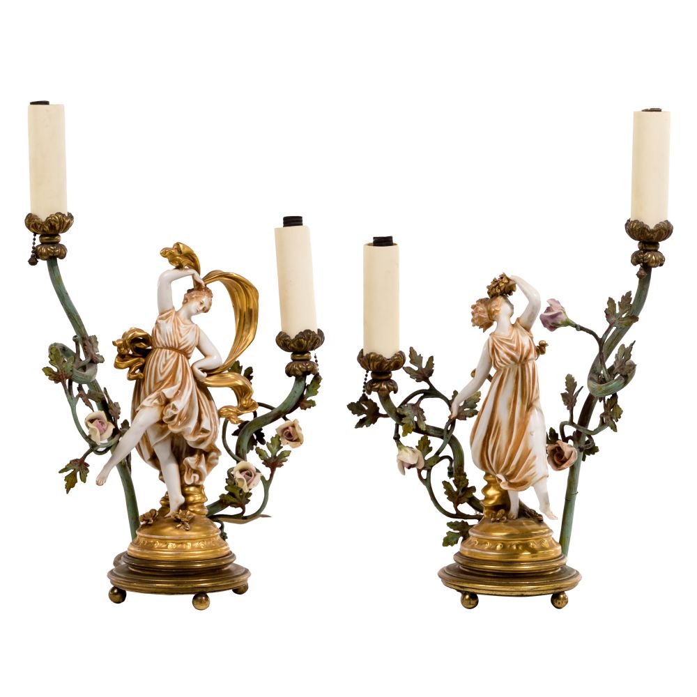 Appraisal: FIGURAL TABLE LAMPSMatched pair of -light candelabra having porcelain classical