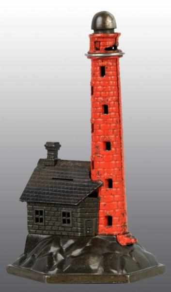 Appraisal: Cast Iron Lighthouse Mechanical Bank Description Working Repair to cabin