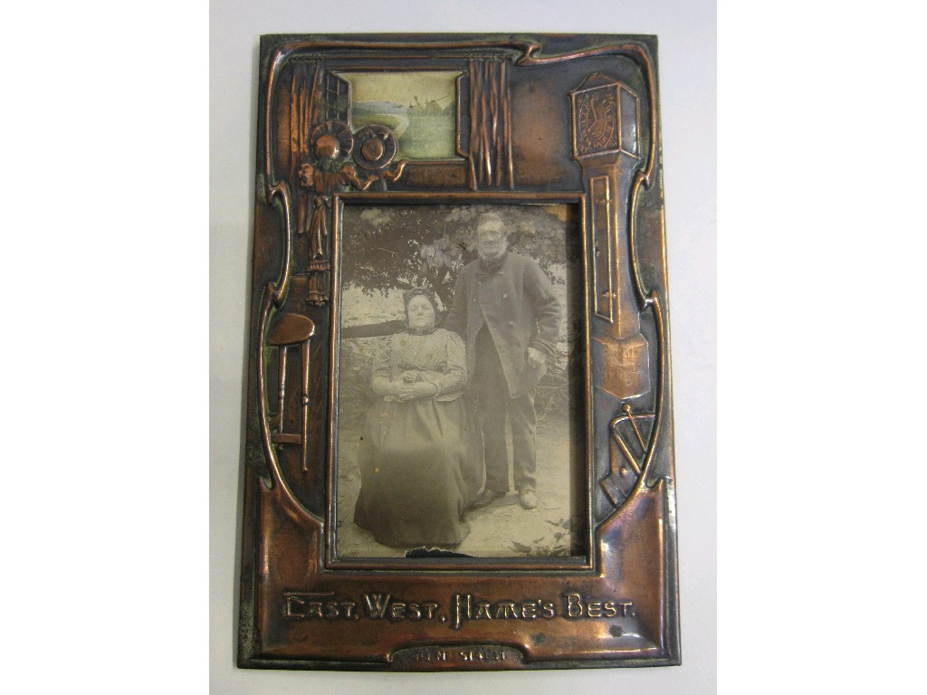 Appraisal: Arts and Crafts copper frame 'East West Hames Best'