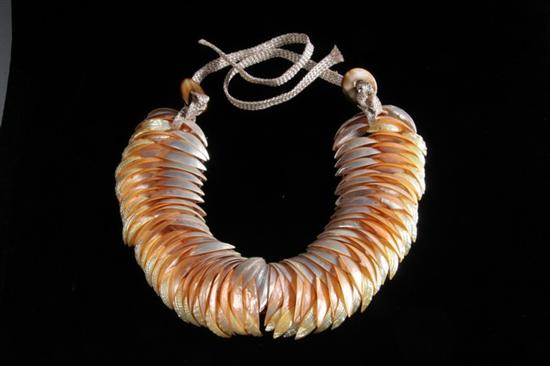 Appraisal: MOTHER-OF-PEARL FLAMINGO CHOKER Gold and beige shell feather style curves