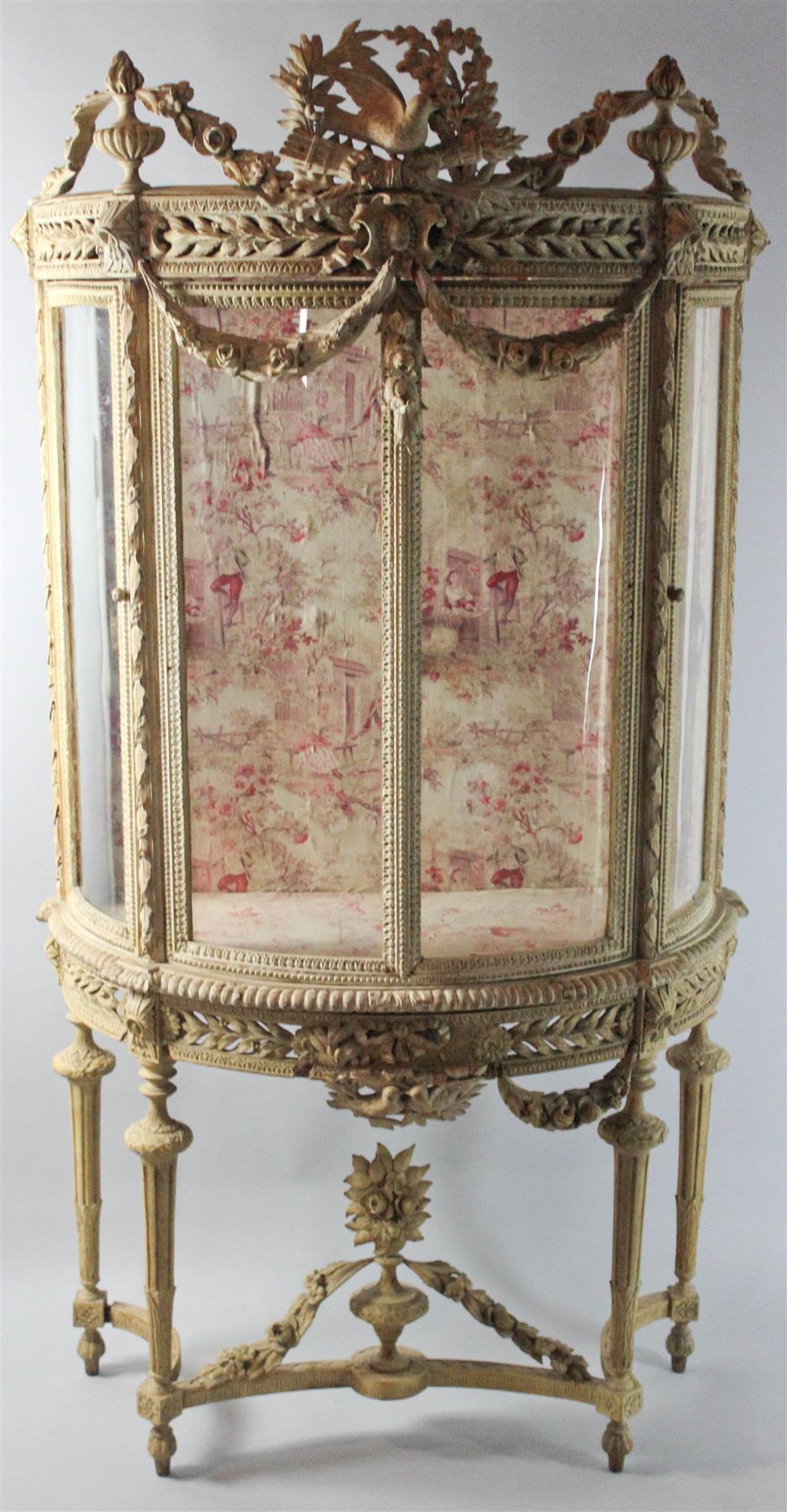 Appraisal: LOUIS XVI STYLE CARVED VITRINE ON STAND the upper vitrine