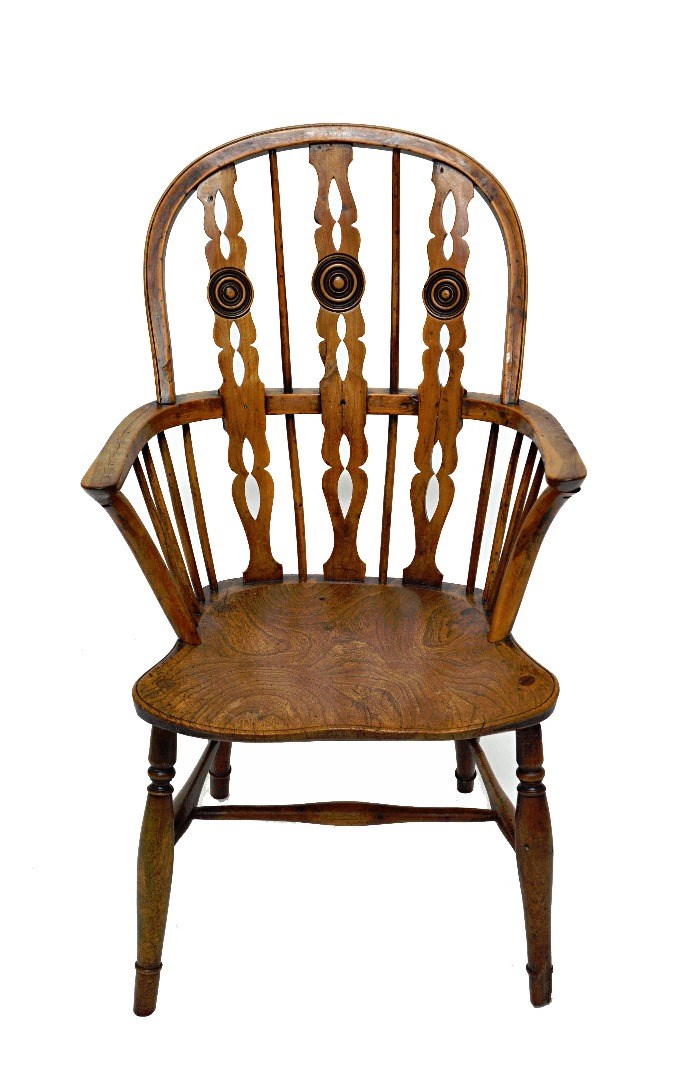 Appraisal: A George III yew and elm bow back Windsor chair