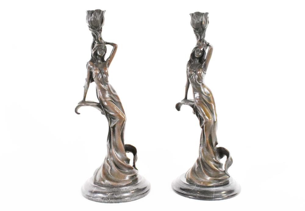 Appraisal: PAIR OF PATINATED BRONZE FIGURAL CANDLESTICKSIn the Art Nouveau style