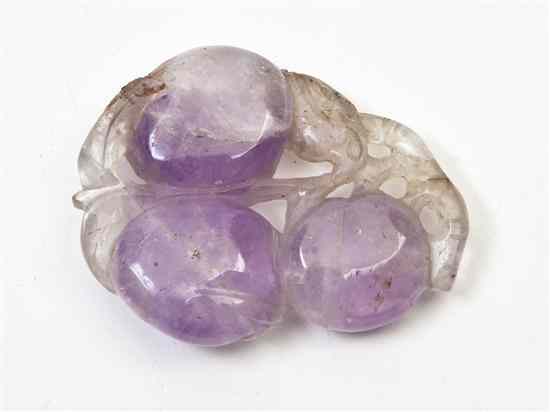 Appraisal: A Chinese Amethyst Toggle depicting three plums having pierced carving