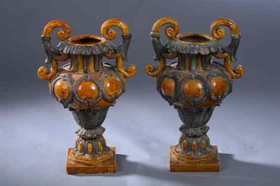 Appraisal: PAIR ITALIAN STYLE CERAMIC GARDEN URNS Urn form having scrolling