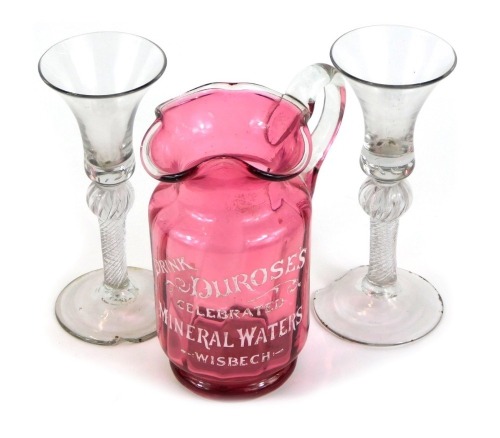 Appraisal: A Victorian cranberry glass water jug advertising 'Drink Durose's Celebrated