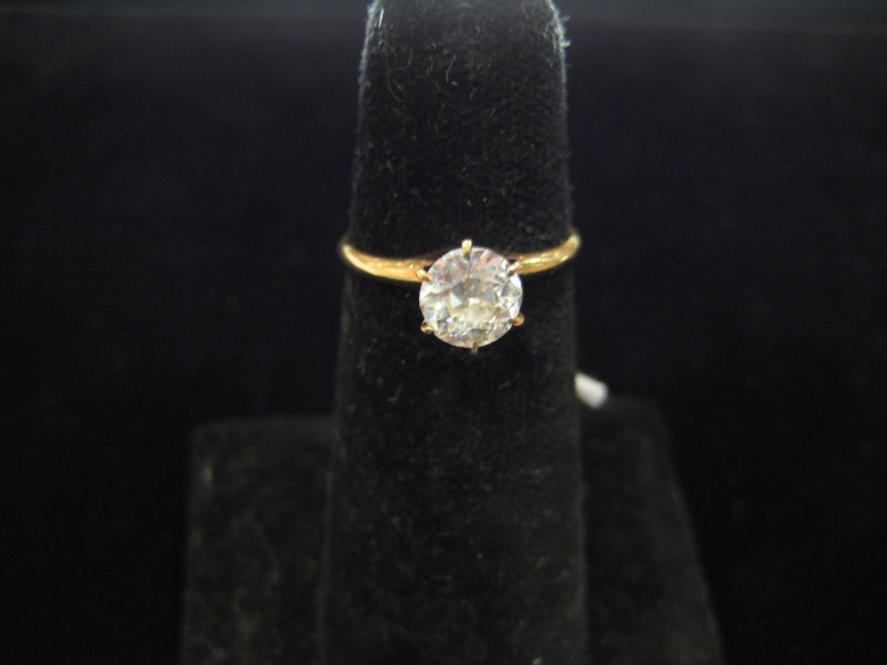 Appraisal: DIAMOND SOLITAIRE k yellow gold solitaire ring set with one