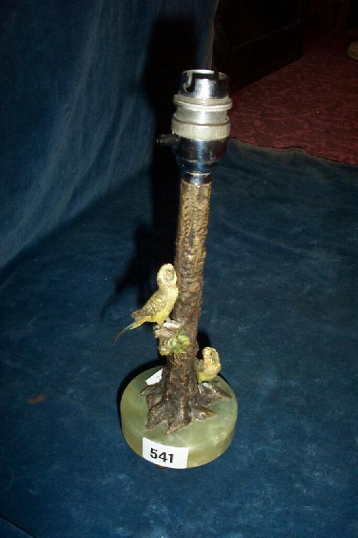 Appraisal: A bronze table lamp with cold painted decoration on an