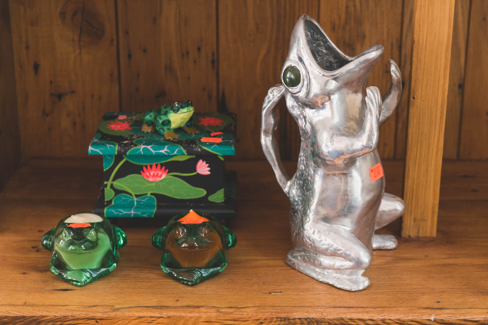 Appraisal: Four frog related articles including pewter gurgle pitcher pair of