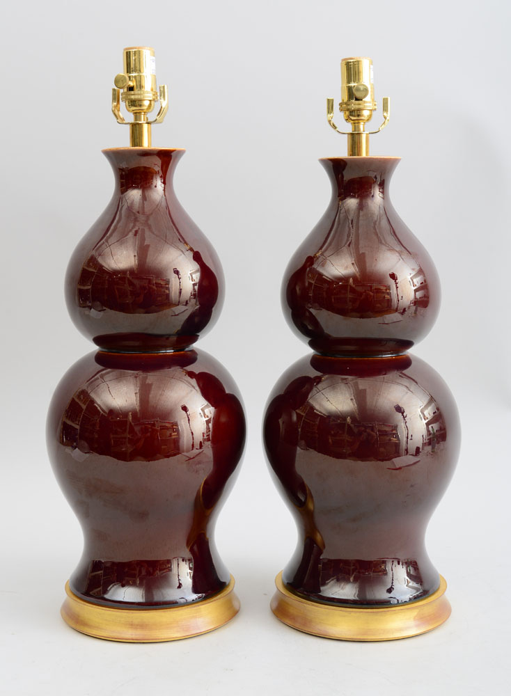 Appraisal: PAIR OF CHINESE STYLE OX BLOOD GLAZED PORCELAIN DOUBLE GOURD-FORM