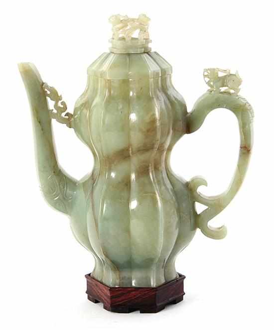 Appraisal: Early Chinese translucent jade gourd-form covered ewer early Ming Dynasty