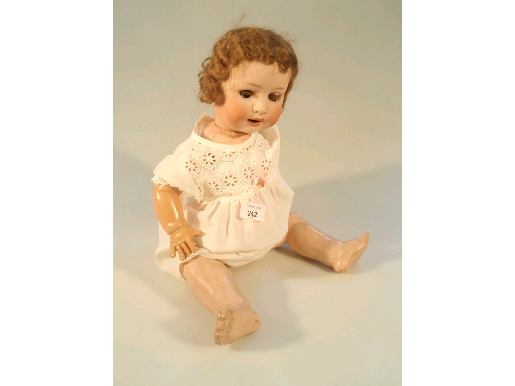 Appraisal: A Heubach Koppelsdorf bisque headed doll with closing eyes open