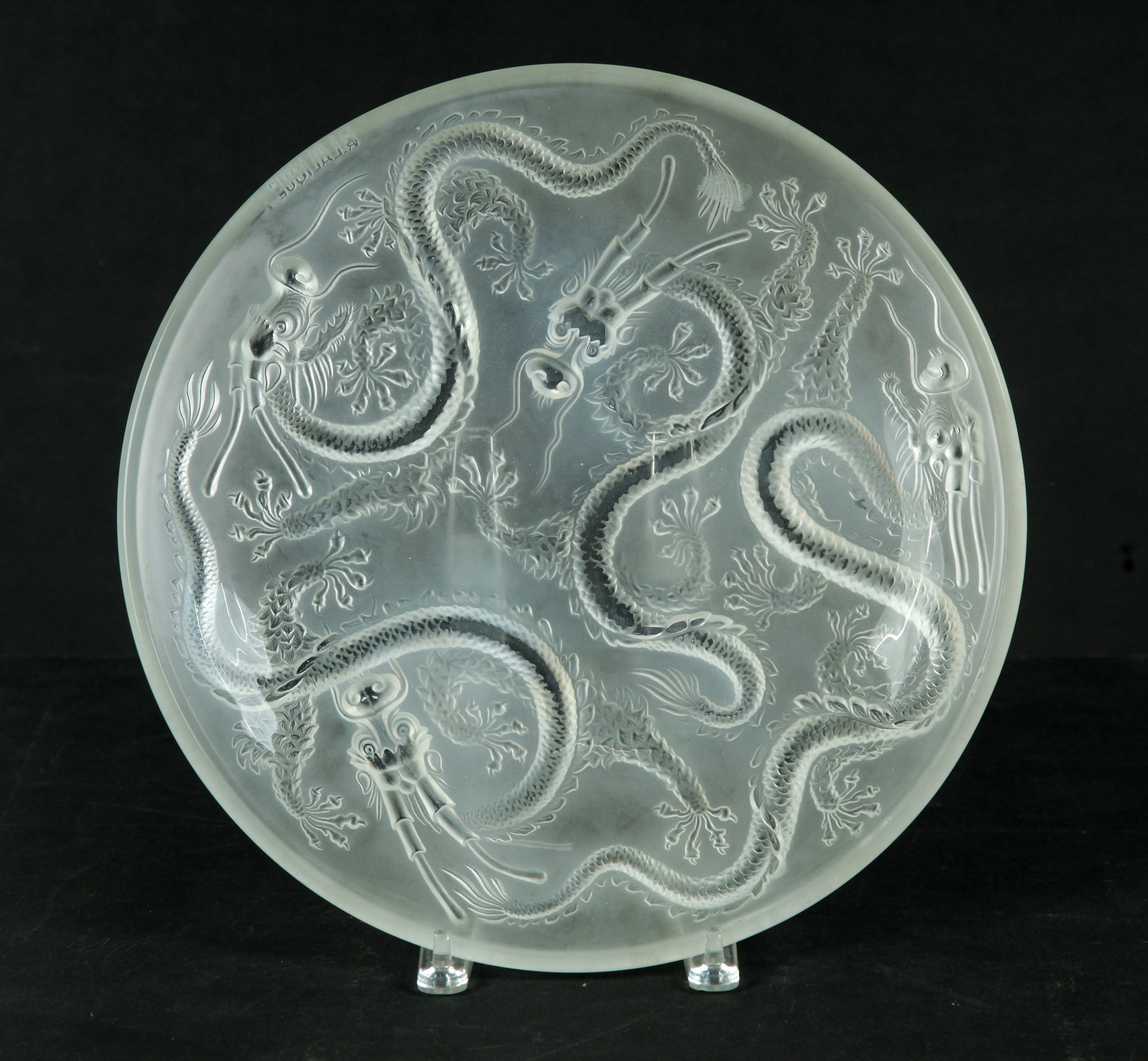 Appraisal: SHALLOW PRESSED AND ACID ETCHED BOWL WITH DRAGON PATTERN Twentieth