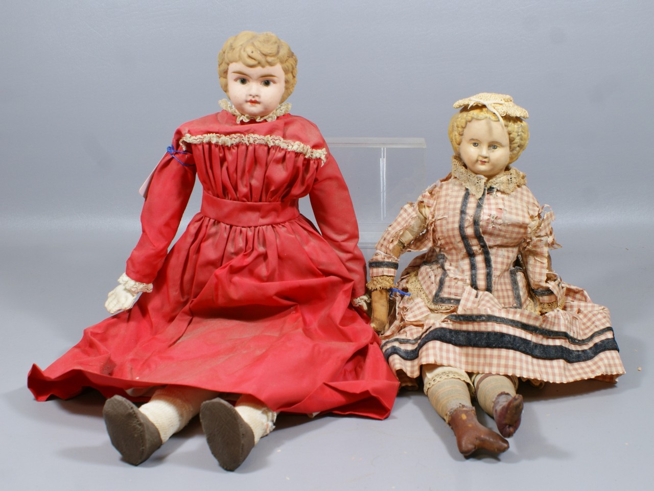 Appraisal: Shoulder Head Dolls the larger is a painted tin head