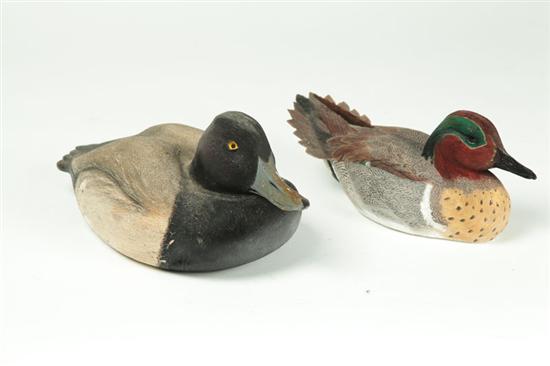 Appraisal: TWO DUCK CARVINGS American late th century wood Competition carvings