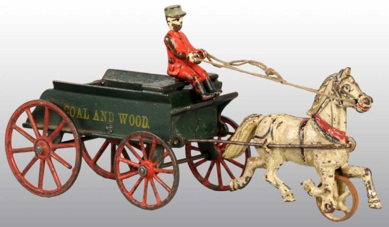 Appraisal: Cast Iron Harris Coal Wood Wagon Toy Description Includes a