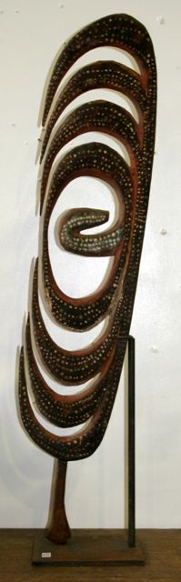 Appraisal: A Karawari Hook in the form of a flattened rib