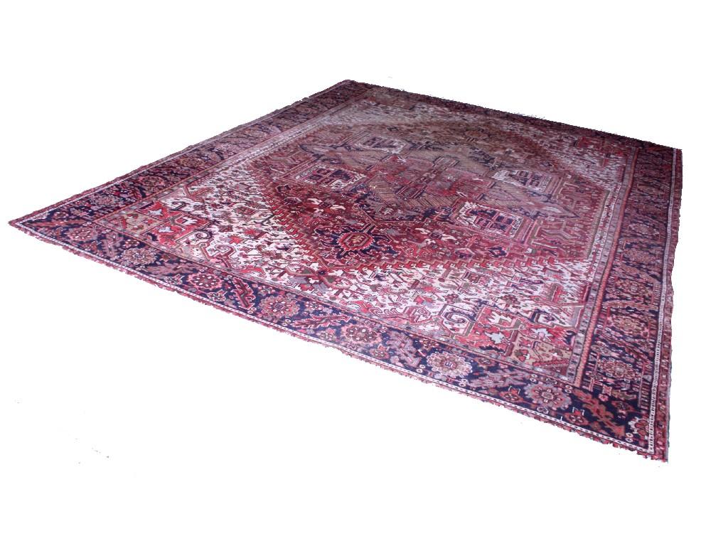 Appraisal: Large Persian style carpet the centre worked with many geometric