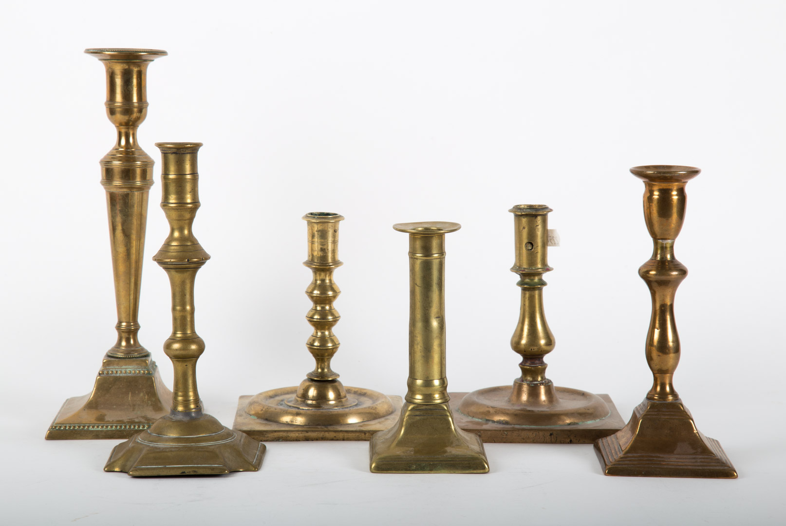 Appraisal: Six assorted brass and bell metal candlesticks th early th