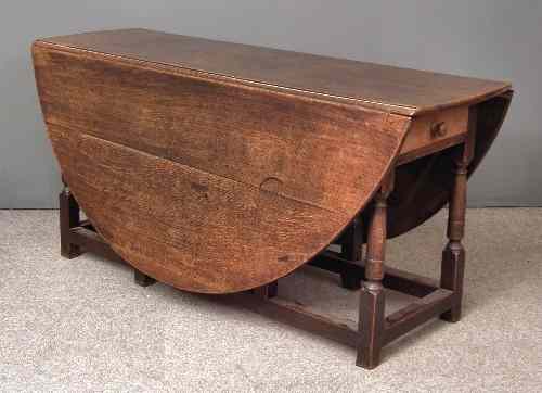 Appraisal: A late th early th Century oak oval gateleg table