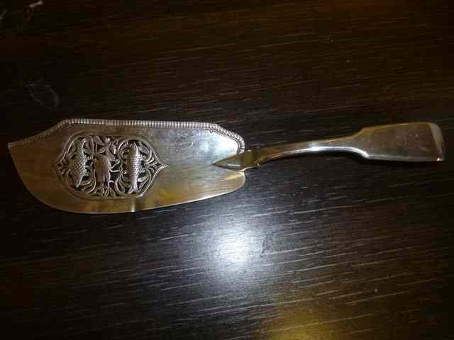 Appraisal: A SILVER FISH SLICE with marks for London