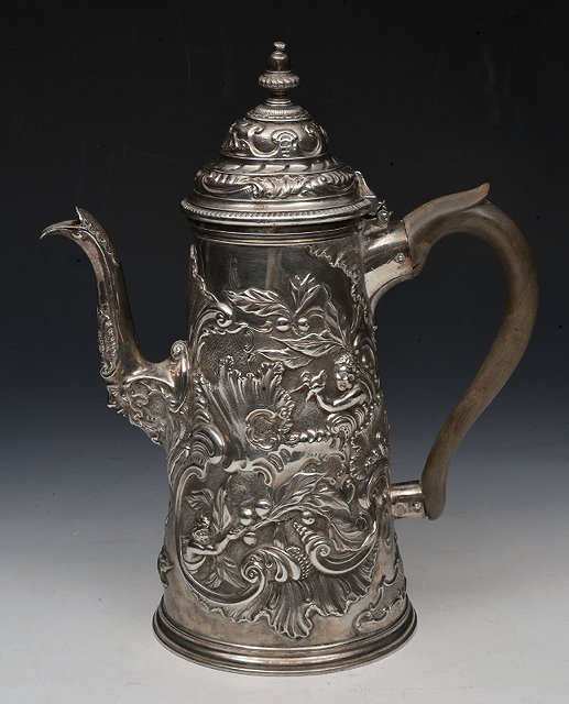 Appraisal: A QUEEN ANNE BRITANNIA SILVER COFFEE POT conical shaped chased