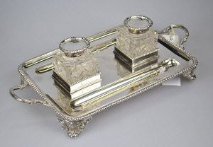 Appraisal: A late Victorian silver ink standish with twin handles gadrooned