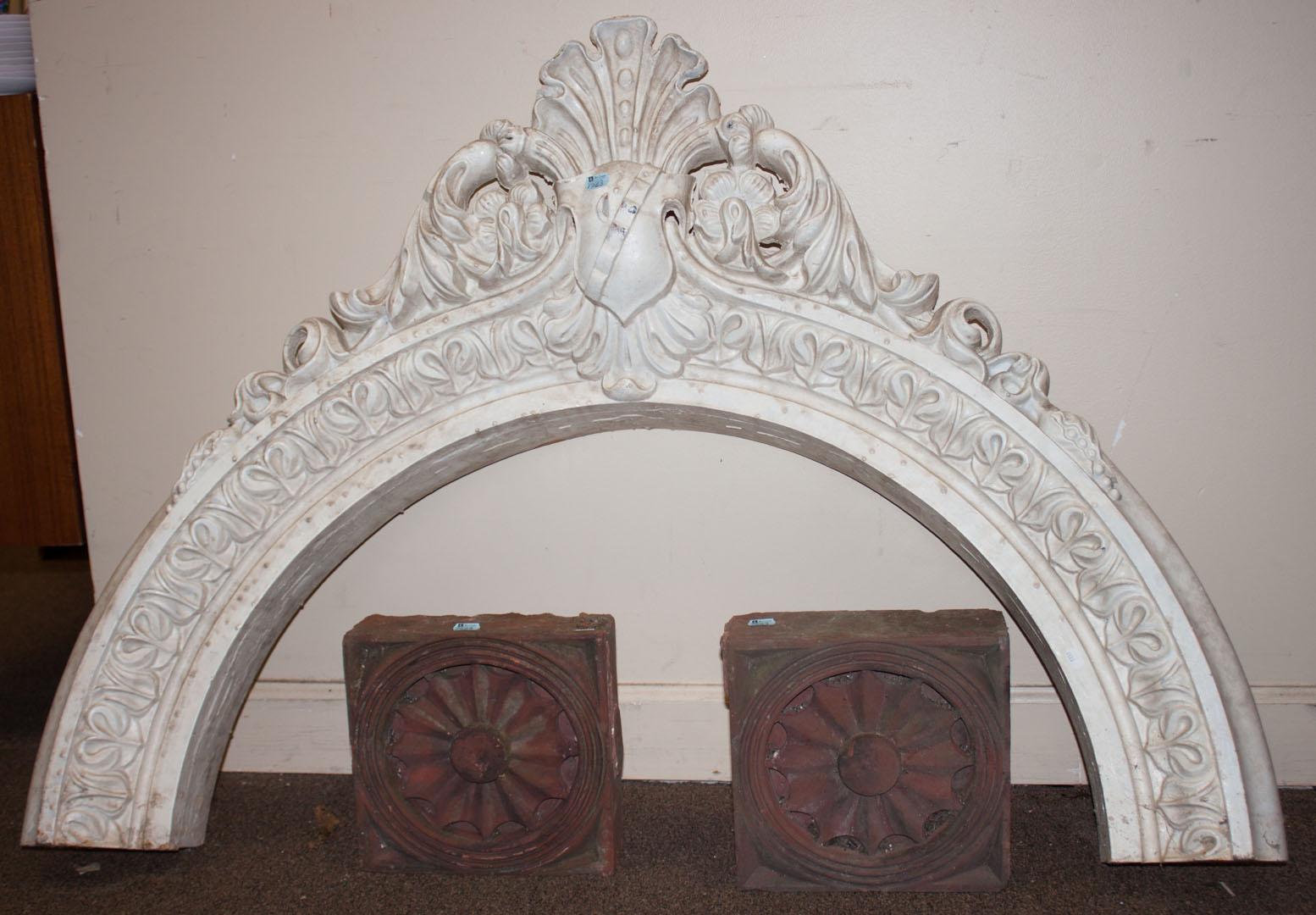 Appraisal: Three architectural items including cast iron pediment and two terracotta