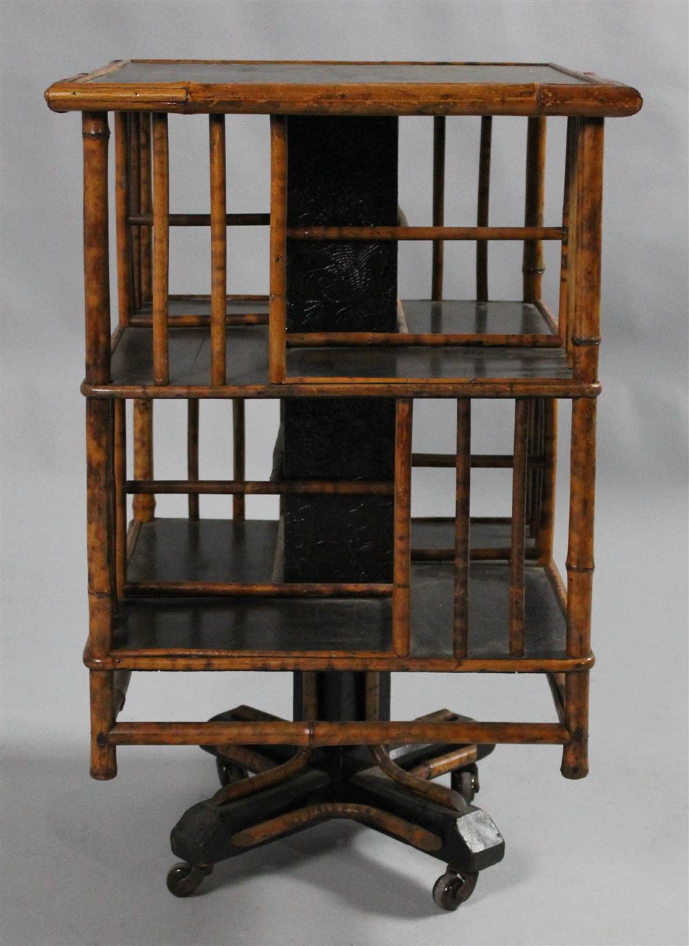 Appraisal: RATTAN REVOLVING BOOKCASE h w in Provenance Retiring Antique Dealer