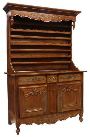 Appraisal: French Provincial Louis XV style fruitwood vaisselier th c having