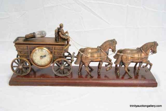 Appraisal: Vintage Horses Wagon United Mantel ClockFrom the estate is a