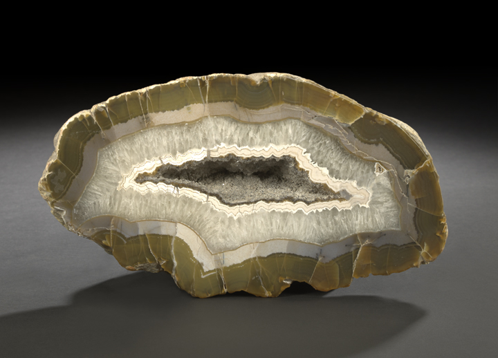 Appraisal: Multi-Colored Agate Geode Slab of roughly ovate shape cut to