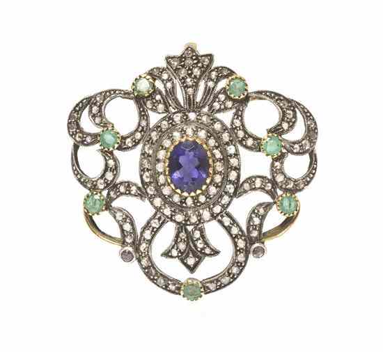 Appraisal: A Silver Topped Yellow Gold Iolite Emerald and Diamond Pendant