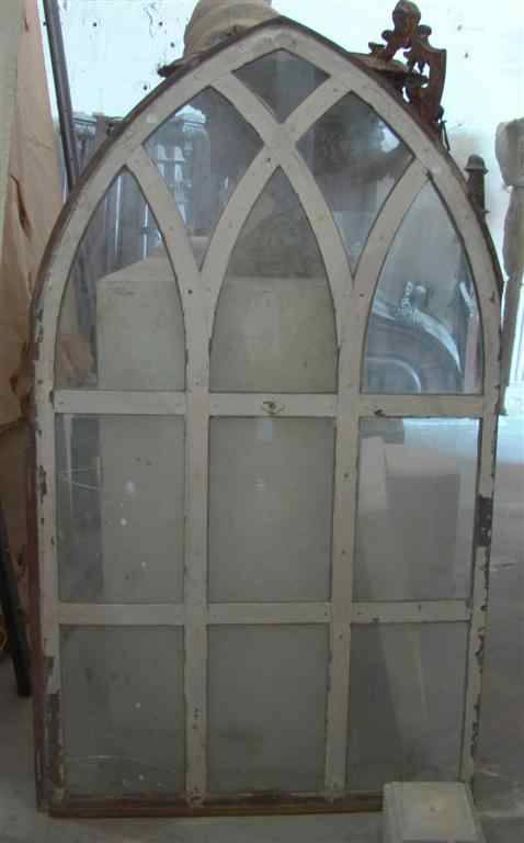 Appraisal: FOUR AMERICAN ARCHED METAL AND GLASS WINDOWS three lacking glass