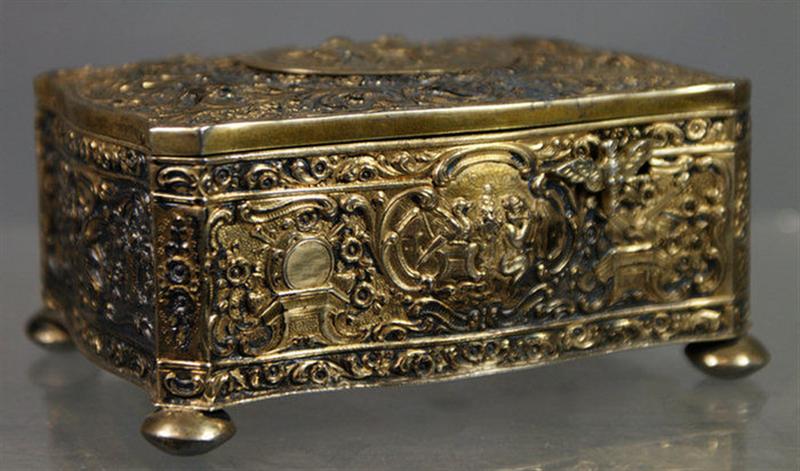 Appraisal: silver repousse musical bird box serpentine case decorated with floral