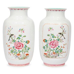 Appraisal: A Pair of Chinese Famille Rose Porcelain Vases each has