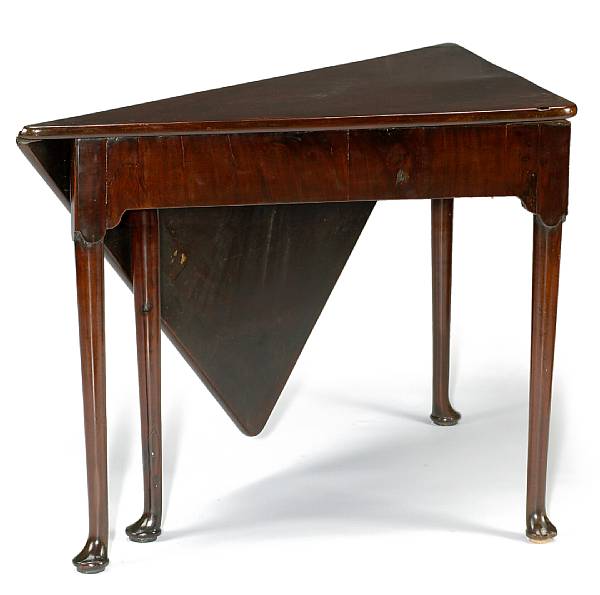 Appraisal: Furniture The triangular hinged top raised on tapering legs ending