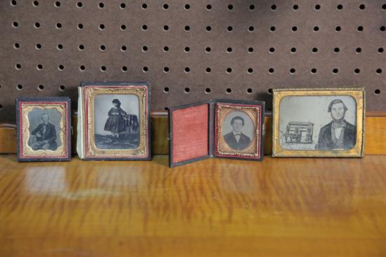 Appraisal: FOUR AMBROTYPES One quarter-plate ambrotype depciting a gentleman seated beside