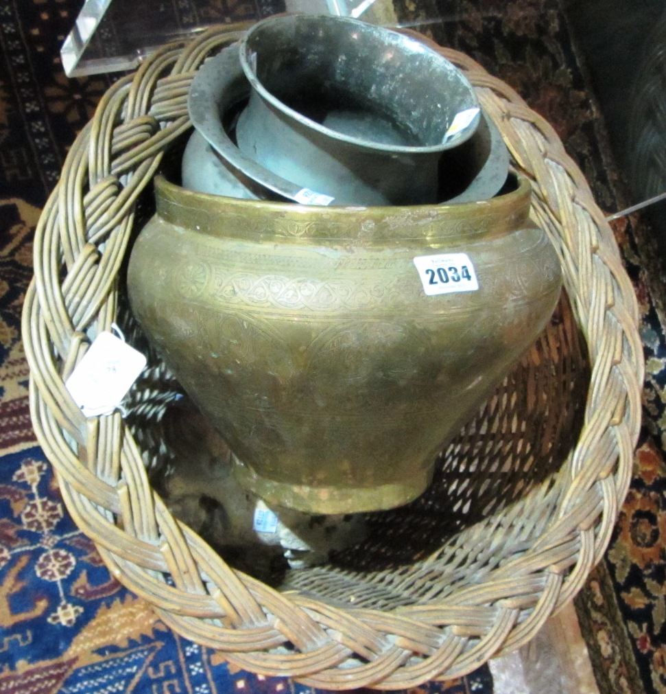 Appraisal: A group of collectables including metal pots stone heads faux