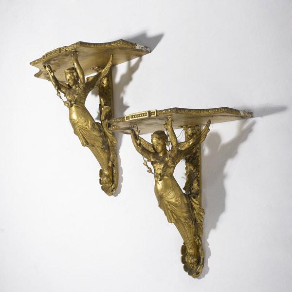 Appraisal: ENGLISH GILDED SCONCES Pair with winged female figures th th